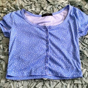 I am selling the second shirt of mine! it is a light vibrant blue crop top.